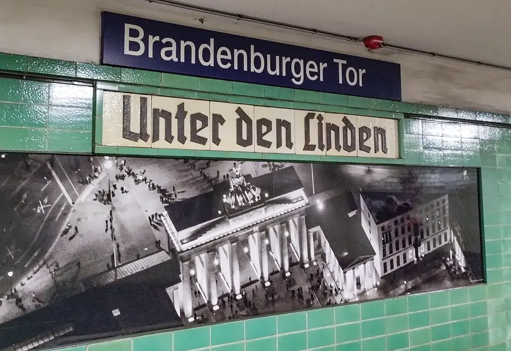 S-Bahn platform 'Brandenburger Tor' also showing the historic sign 'Unter den Linden'