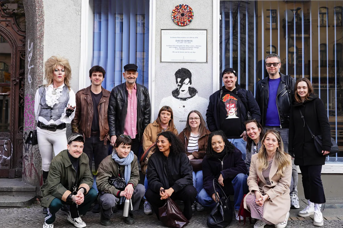 Group posing at Bowie's former Berlin flat, Hauptstrasse, Schöneberg