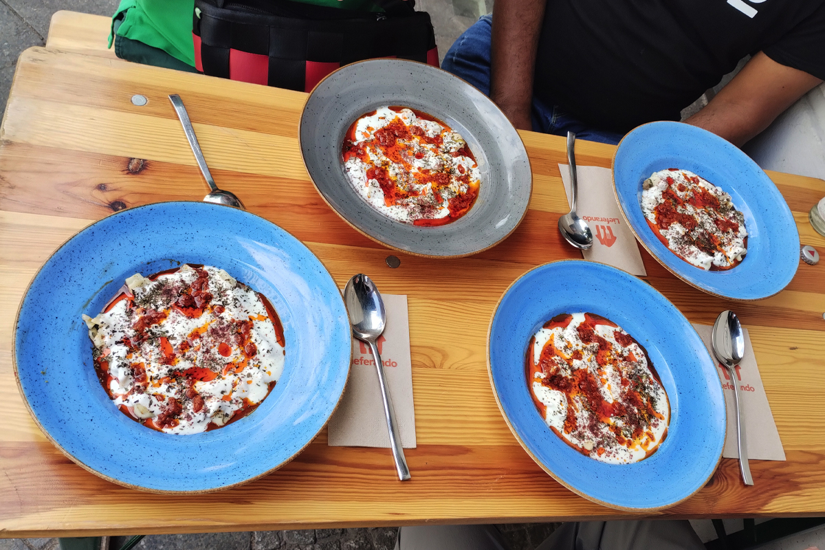 Close-up of plates of Turkish Manti